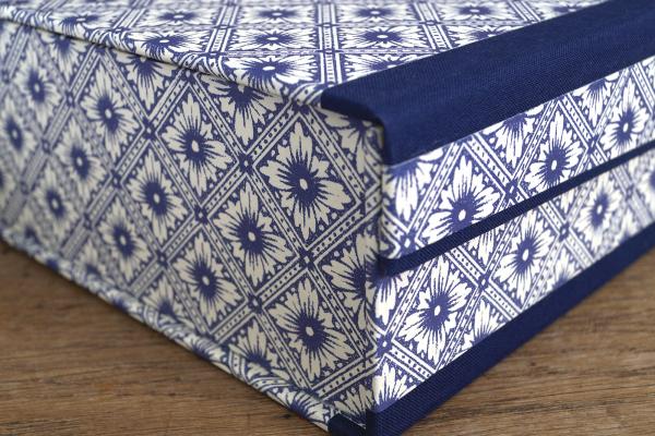 Spelling box with blue linen edges
